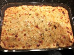 a casserole in a glass dish on top of a stove