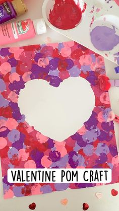 valentine's day art project for kids using pom - poms and glue