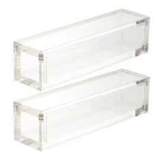 two clear acrylic boxes sitting next to each other on a white background,