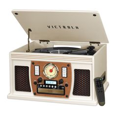 an old - fashioned record player with radio and remote control