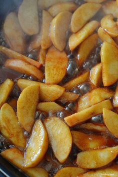 the food is being cooked in the pan on the stove top and ready to be eaten