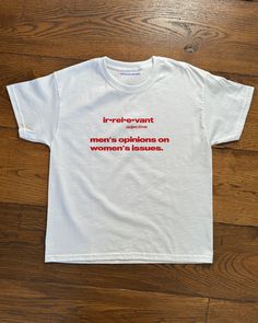 'irrelevant - men's opinions on women's issues Baby Tee Irrelevant Men's Opinions On Women's Issues Baby Tee, Heavy Cotton, Iconic Slogan T-shirt, 90s Aesthetic Vintage Tee Trending Print Top  - 90's Baby tee style (made for adults) - 100% cotton - Classic fit - Runs true to size (refer to size chart) - Tear-away label - Y2K Vintage Streetwear Trending Fashion - Environmentally sustainable made-to-order system Baby tee's were popularised in the '90s, characterised by it's very short sleeves and Hannah Montana Closet, 90s Aesthetic Vintage, Funny Baby Tees, Clothing Brand Ideas, Slogan Tees, Women Issues, Slogan T Shirt, Y2k Baby Tee, Baby Tees