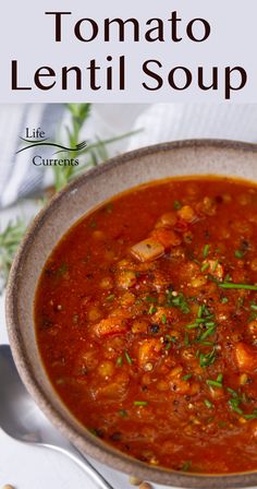 a bowl of tomato lentil soup on a table