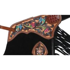 a black and brown purse with fringes on the handle, decorated with flowers and leaves