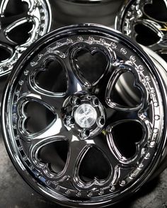 chrome wheels with hearts on them are shown