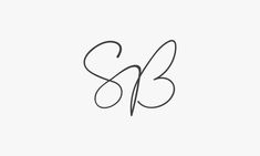 the letter s and b is inscribed in cursive handwriting on a white background