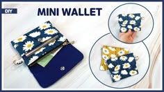 the mini wallet is made from fabric and has daisies on it