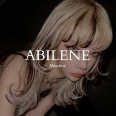 a woman with long blonde hair is posing for the cover of abilene magazine