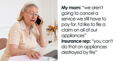 an older woman sitting at a desk talking on the phone