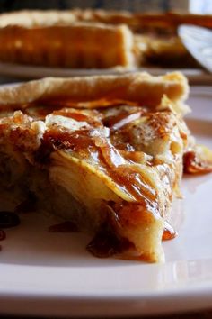 a piece of pie sitting on top of a white plate