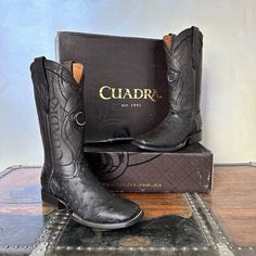 "A true pioneer in luxury exotic boots, Cuadra is committed in creating innovative designs using avant-garde technologies and an artisan concept for each pair of hand-crafted boots. Famously known for the quality of their genuine leathers, each natural mark is a reminder of the care that goes into leaving the essence of the leather in its truest form. MADE IN MEXICO Brand: Cuadra For: Men (view size chart) Details: Sku: 3Z1OA1 Color: Black Genuine Ostrich Full Quill Leather Wide Square Toe 12\" Leather Shaft 1.5\" Heel Leather Sole Leather Lining Laser & Embroidery Contact us for more details PLEASE READ BEFORE PURCHASE: The picture is an ACCURATE REPRESENTATION. Colors in the pictures may vary a little by effects of light. Leather color can vary from the pictures due to the nature of the Luxury Men's Square Toe Cowboy Boots, Luxury Men's Square Toe Boots, Luxury Hand Tooled Men's Boots, Luxury Men's Cowboy Boots With Leather Footbed, Luxury Men's Cowboy Boots With Leather Sole, Luxury Men's Closed Toe Cowboy Boots, Luxury Western Men's Boots, Custom Black Leather Boots, Luxury Fitted Moc Toe Boots