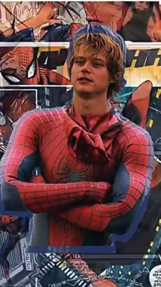 the amazing spider - man character has his arms crossed in front of an image of himself