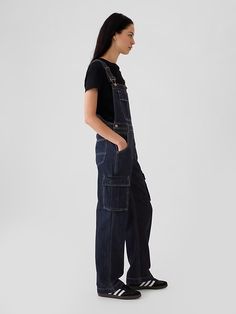 Relaxed Denim Cargo Overalls | Gap Utility Style Dark Wash Denim Jumpsuit With Bib Front, Dark Wash Utility Denim Jumpsuit With Bib Front, Utility Style Dark Wash Denim Jumpsuit, Dark Wash Utility Denim Jumpsuit, Utility Workwear Shortalls With Pockets, Utility Shortalls With Pockets For Workwear, Utility Overalls With Pockets For Workwear, Utility Denim Jumpsuit With Pockets For Work, Utility Style Workwear Shortalls With Pockets