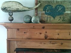 an old fireplace mantel with some decorative items on top