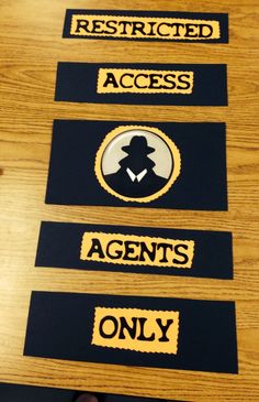 three stickers that say restricted, access, agent's only