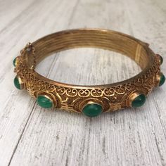 Vintage Chinese Filigree Silver Vermeil and Jade Hinged - Etsy Vintage Green Bangle For Wedding, Antique Cabochon Bracelets For Wedding, Vintage Gemstone Cuff Bracelet, Vintage Gemstone Cuff Bracelet Bangle, Elegant Carved Green Bangle, Vintage Gold Bangle With Gemstone, Ceremonial Green Bangle With Intricate Design, Elegant Green Carved Bangle, Wedding Bangle Bracelet With Cabochon