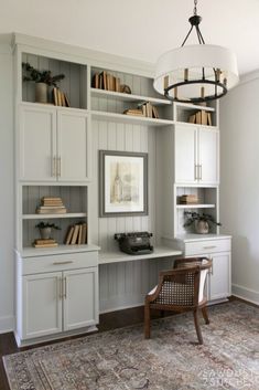 a room that has some bookshelves in it