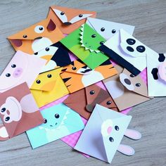 paper animals are cut out and placed on the table to make them look like they're