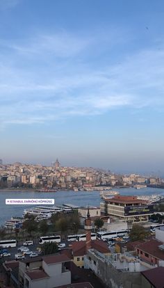 a city with lots of buildings next to the water