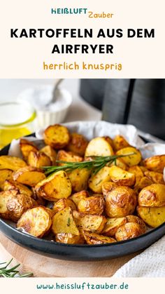 a plate full of roasted potatoes with herbs on top and the words, kartoffen aus dem airfryer