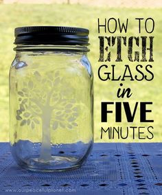 a mason jar sitting on top of a table with the words how to etch glass in five minutes