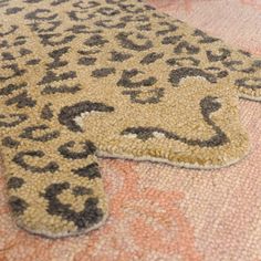 a leopard print rug on the floor