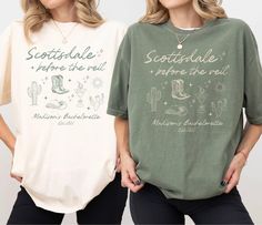 two women standing next to each other wearing t - shirts with cactus designs on them