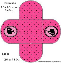 a pink box with black polka dots and an elephant in the center, on a white background