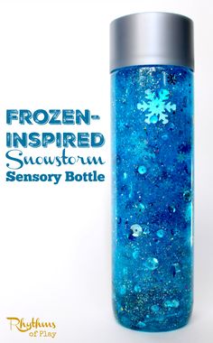 a blue bottle with snow flakes on it and the words frozen - inspired snowstorm sensory bottle