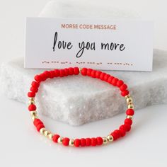 Our "Love You More" Bubble Morse Code Bracelet is the perfect wife, best friend, sister, or girlfriend gift with each dainty bead and dash carrying a secret reminder of your special bond. *listing is for one endless morse code bracelet    BRACELET  * High quality glass seed beads * We use 1 colored bead for the dashes and 1 gold or silver bead for the dots * Message starts and ends with a gold or silver rondelle * Colored beds are 5mm * Hand strung on an elastic band * Choose from XS (6"), S/M (6.5"), M/L (7") and L/XL (7.5") bracelet size * Gently roll on/off bracelets prevents overstretching the elastic, helping them last longer. * handmade with care and love at our studio in San Diego, CA USA HOW - TO - ORDER  1. Select a METAL / SIZE option in the first drop down 2. Choose your BEAD CO Morse Code Bead Bracelet, The Perfect Wife, Code Morse, Best Friend Birthday Gift, Perfect Wife, Friend Birthday Gift, Morse Code Bracelet, Hidden Message, Morse Code