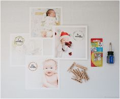 the wall is covered with pictures and magnets for baby's first birthday party