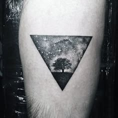 a black and white photo of a triangle with trees in it on the left thigh