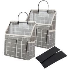 two gray and white storage baskets with handles