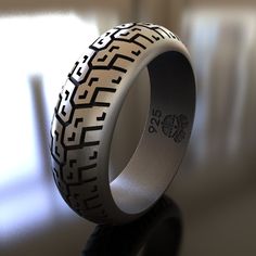 Embody the thrill of the open road with our Racer Motorcycle Tyre Ring. This handcrafted 925 sterling silver piece features a bold, biker-inspired design, showcasing a detailed motorcycle tyre tread pattern, symbolizing speed, adventure, and the spirit of the ride. This distinctive, unisex ring is perfect for motorcycle enthusiasts, riders, or anyone who appreciates the passion and freedom of the biking lifestyle. The intricate craftsmanship and polished finish make it a standout accessory for a Black Biker Rings For Biker Events, Black Biker Style Ring As Gift, Motorcycle Jewelry, Bike Tire Jewelry, Indian Motorcycle Jewelry, Tire Rings, Viking Ring, Masonic Ring, Biker Jewelry