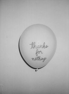 a white balloon with the words thanks for nothing written on it