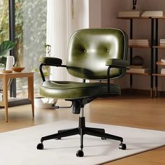 a green office chair sitting on top of a white rug in front of a window