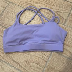 Purple, Sports Bra, With Pads, Crisscross Back, Size Small. Amazon/Don’t Know Brand. Never Worn Purple Sports Bra, Spring Sports Tops With Straps, Casual Strappy Gym Activewear, Sporty Spring Activewear With Cross Back, Cheap Purple Sports Bra, Spring Cross-back Activewear For Gym, Athleisure Tops With Crisscross Straps For Sports, Spring Sporty Activewear With Cross Back, Athleisure Sports Tops With Crisscross Straps