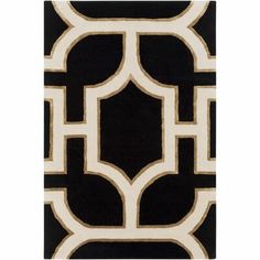 a black and white rug with an abstract design