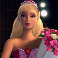 the barbie doll is wearing a tiara and holding a bouquet of roses in her hand