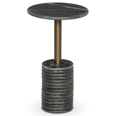 a round table with a metal base and black marble on the top, against a white background