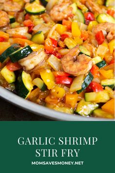 shrimp stir fry with zucchini and peppers in a pan