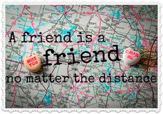 two buttons that are on top of a map with the words friend is a friend no matter the distance