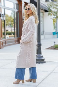 Wrap yourself in cozy comfort with our Chunky Cable Knit Duster Cardigan in a soft light beige hue! Designed for the free-spirited and effortlessly chic, this longline cardigan is the perfect layering piece for any boho-inspired look. Crafted from a chunky cabe knit material, this duster cardigan offers maximum coziness, giving you that wrapped-in-a-blanket feel with a stylish twist. Perfect for layering during those crisp fall mornings or cool evenings, this cardigan is an essential for any boh Sorority Rush Outfits, Rush Outfits, Fall Style Guide, Gameday Dress, Duster Cardigan, Casual White Dress, Game Dresses, Blazer Coat, Denim Shop