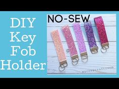 four key fob holders with glitter on them