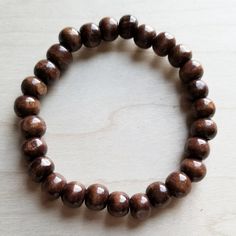 Larger Wood Beaded Stretch bracelet can be matched with others in the collection to create your own look! 8mm wood bead Although your item will resemble the photo, each piece is created by hand, so no two are identical.Thank you for visiting The Jewelry Junkie! Casual Cheap Wooden Beaded Bracelets, Cheap Wooden Beads Stretch Bracelet As Gift, Cheap Adjustable Stretch Bracelet With Wooden Beads, Wooden Beads Jewelry Greatergood, Cheap Casual Wooden Beaded Bracelets, Cheap Bohemian Stretch Bracelet With Round Beads, Cheap Brown Beaded Bracelets For Everyday, Affordable Elegant Jewelry With Wooden Beads, Cheap Adjustable Traditional Stretch Bracelet