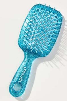 Highlights: DuoFlex Anti-Static Bristles™ work to gently detangle and reduce breakage Designed for wet and dry hair Backless vented cushion works to reduce styling time 105 dual length bristles Dimensions: 3.25" L, 1.75" W, 8.5" D Key Ingredients: Plastic How To Use: For best detangling results, hold the UNbrush® horizontally, gently brush hair from the bottom of the strand, and work your way up to the root. Repeat as needed | UNBrush Detangling Hair Brush by FHI Heat in Blue, Women's, Plastic at Anthropologie Unbrush Brush, Cool Hair, Detangling Hair, Detangling Hair Brush, Brush Hair, Hair Detangler, Beauty Wellness, Dry Hair, Wet And Dry