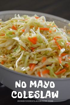 coleslaw in a bowl with carrots and celery