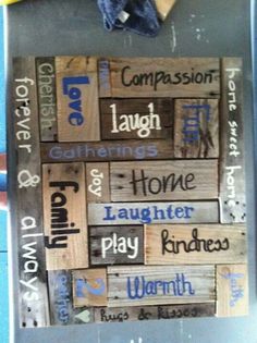 a wooden sign with words written on it