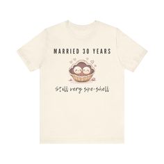 a t - shirt that says married 30 years and has two slots on it