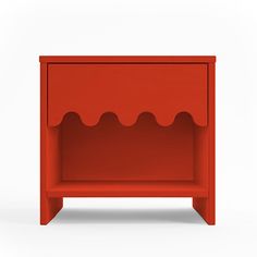 a red nightstand with an open shelf on one side and wavy design on the other